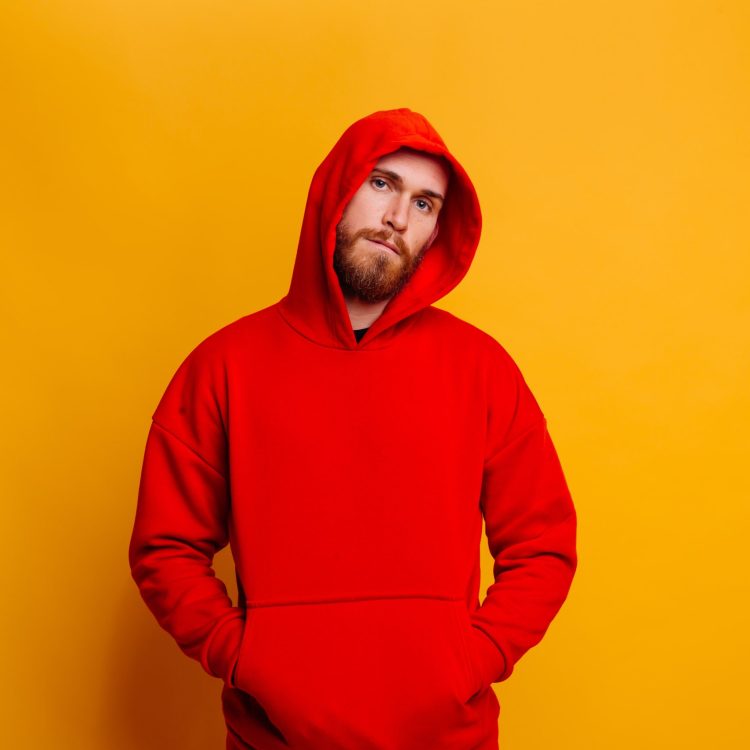 happy-handsome-brutal-bearder-man-wearing-warm-red-winter-trendy-fleece-hoodie-min